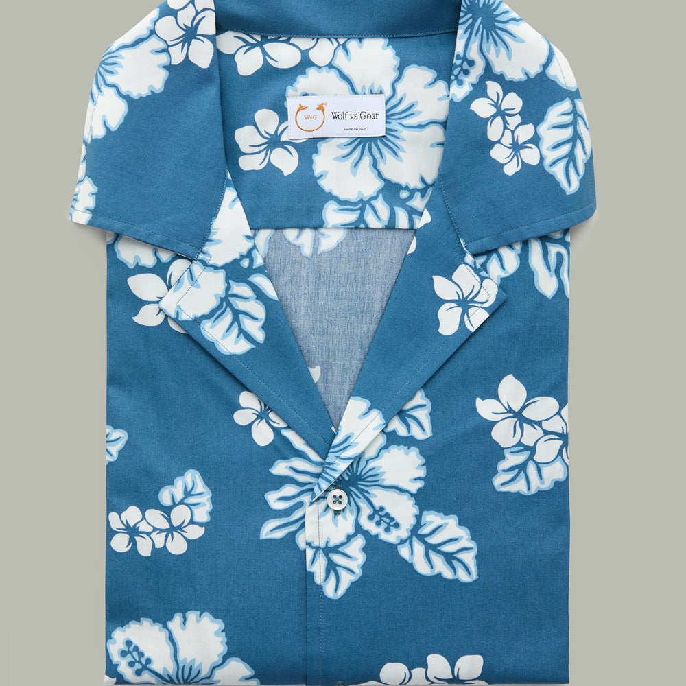 
                  
                    Cotton Bowling Shirt White Hibiscus Blue Background
                  
                